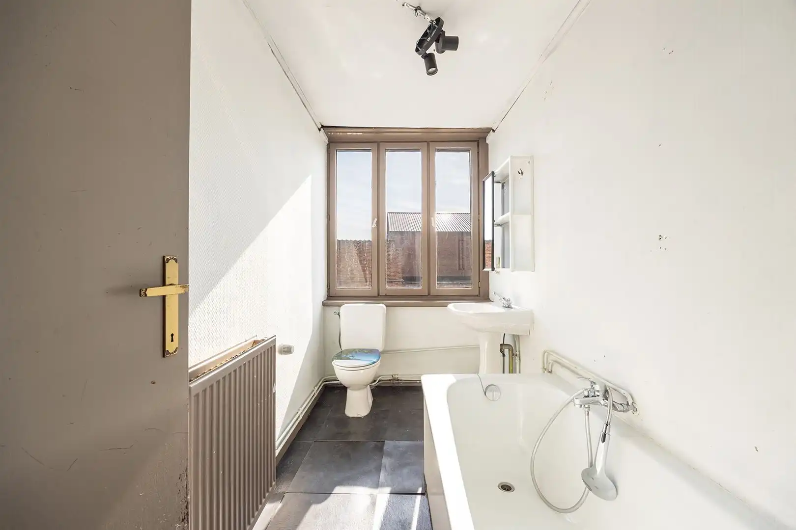 Handelshuis met studio en veel potentieel! foto 11