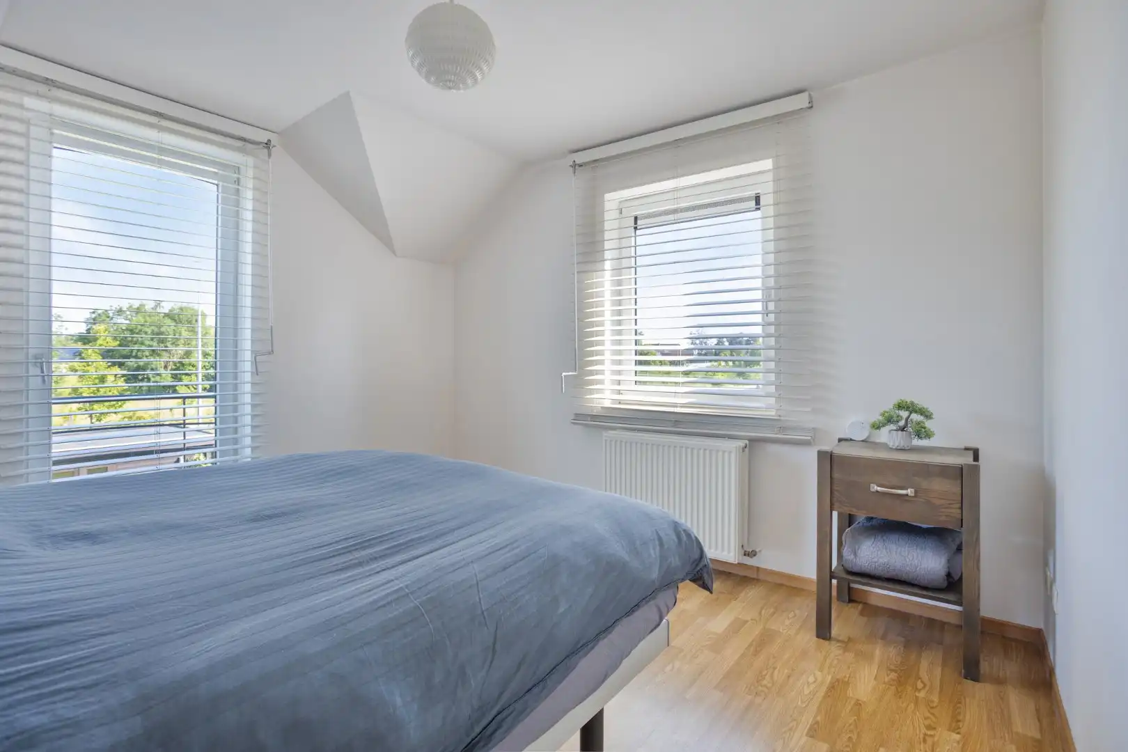Verzorgde woning met 3 slaapkamers, garage, zonnepanelen en zonnige tuin te Tongeren foto 12