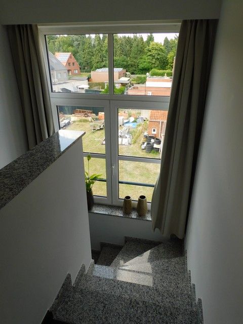Duplex appartement met groot terras en garage foto 10