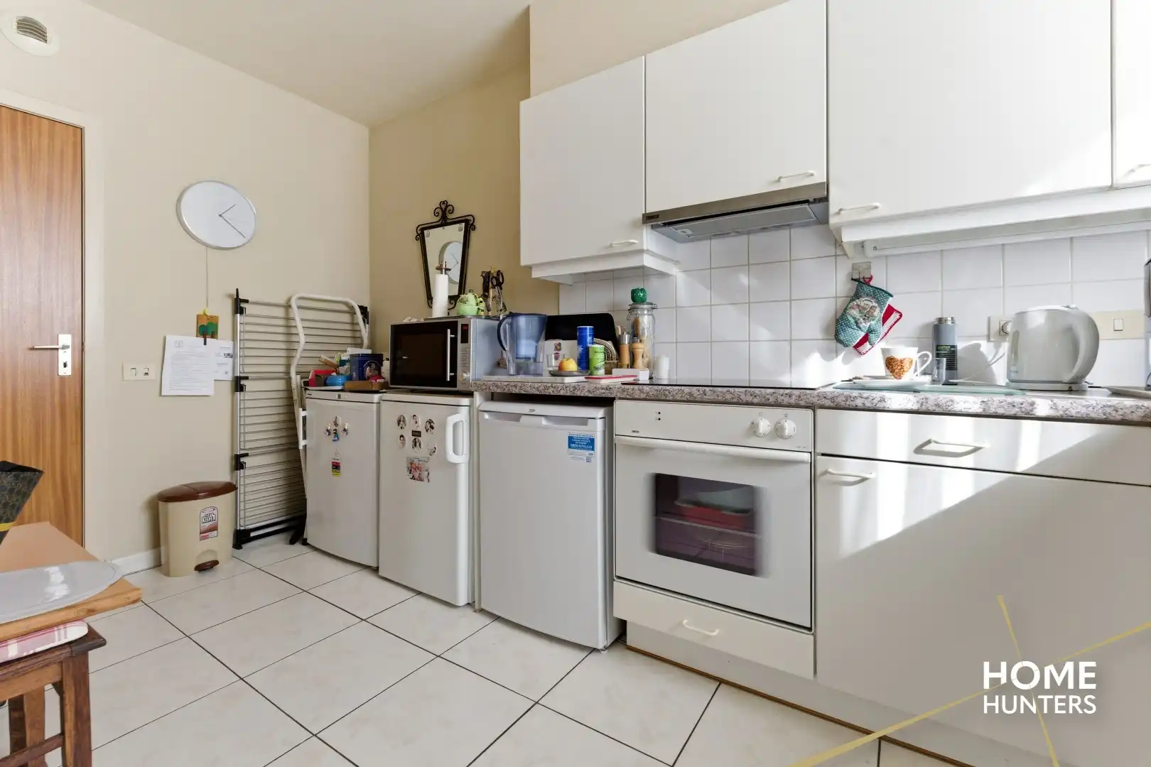 Instapklaar gelijkvloers appartement met 2 slaapkamers en ruime tuin foto 11