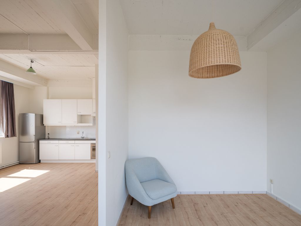 Unieke, lichtrijke cityflat nabij de Coupure foto {{pictureIndex}}