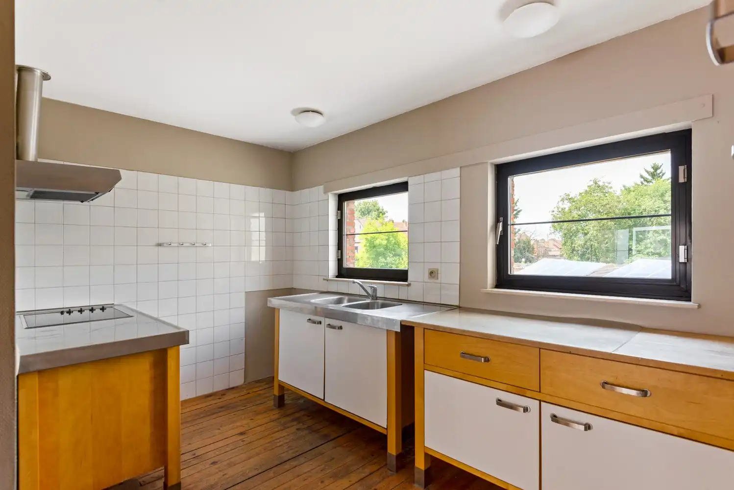 Handelshuis met 2 handelsruimtes en appartement in het hart van Wommelgem. foto 20