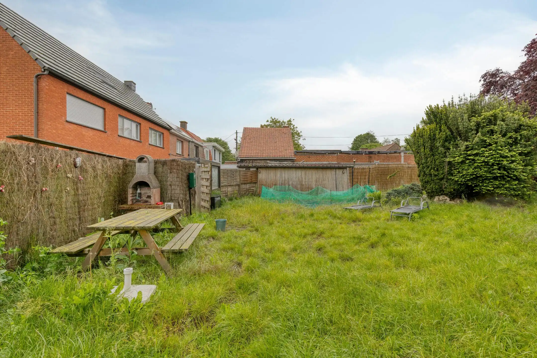 Te renoveren woning met grote tuin en bijgebouw te Heule foto 6