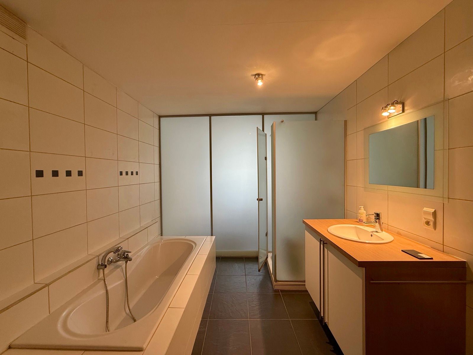 Gezellig appartement met twee slaapkamers en tuintje foto 17