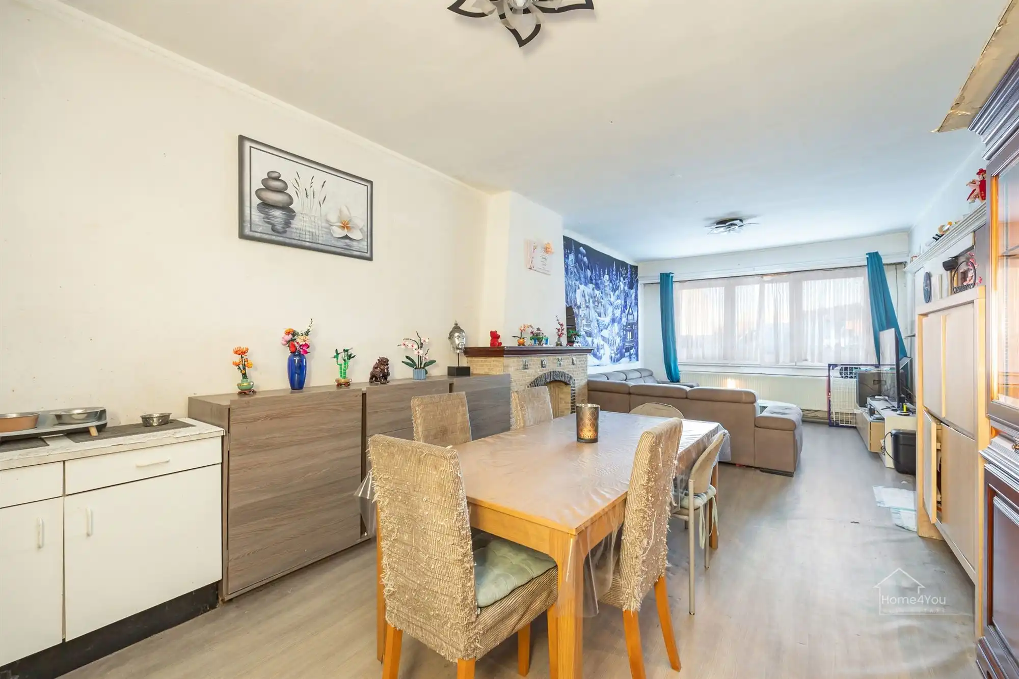 Op te frissen woning met zéér ruime extra zolder foto 6