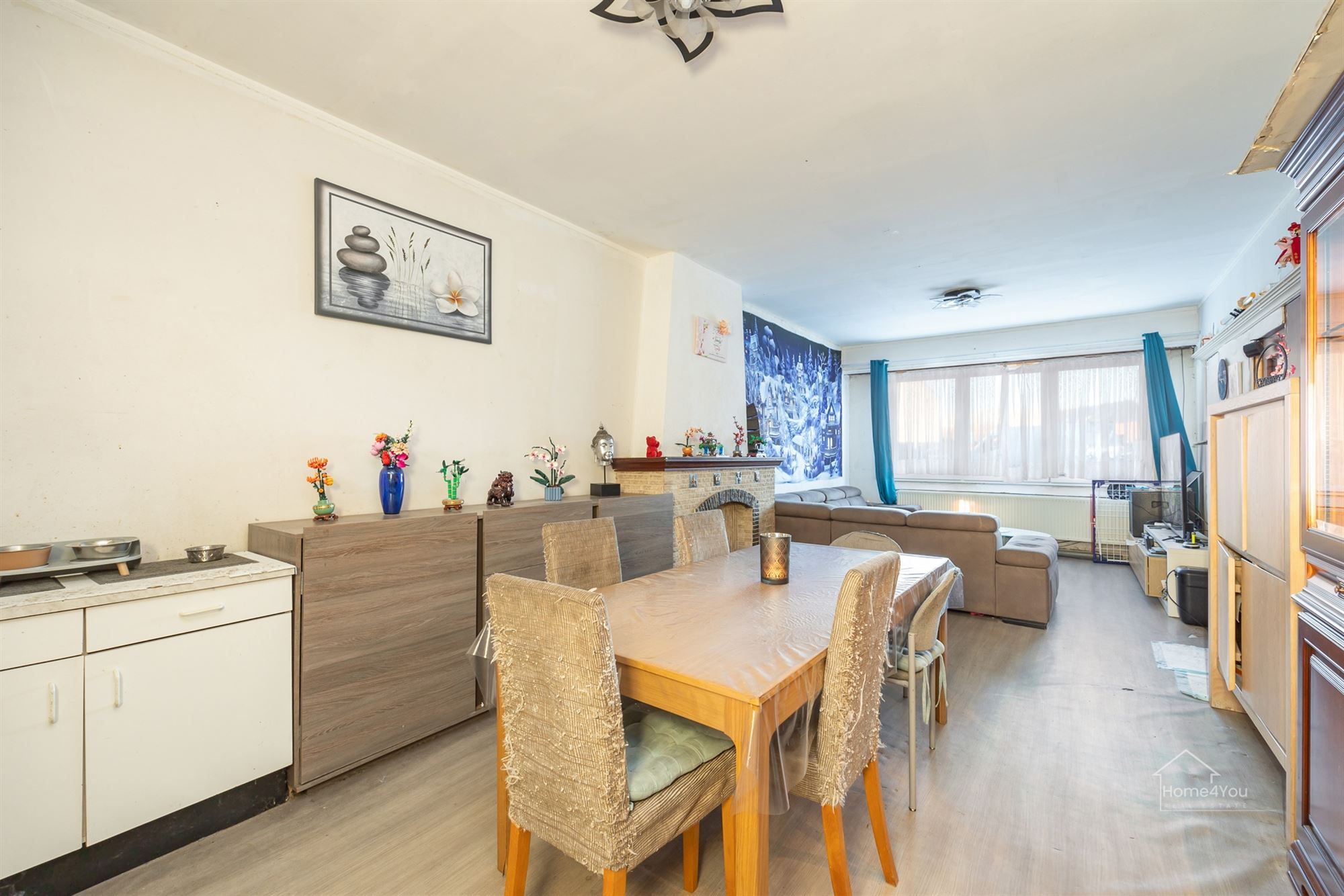 Op te frissen woning met zéér ruime extra zolder foto 6