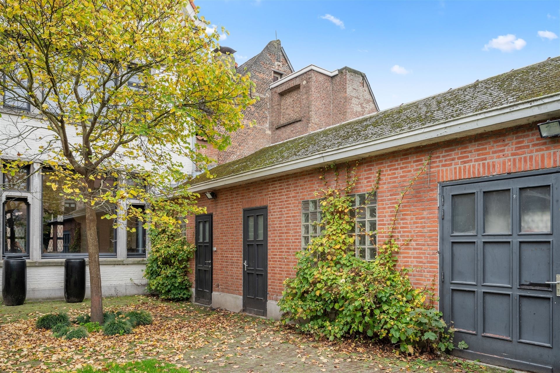 Unieke woning in het Mechels Begijnenhof met 3 slaapkamers en 2 badkamers foto 18