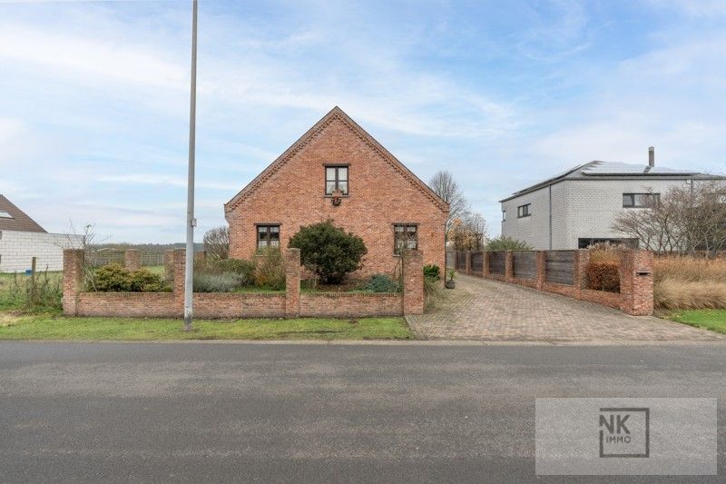 Charmante fermette woning met 4 slaapkamers, bureau en ruime werkplaats op een prachtig perceel in Arendonk! foto 2