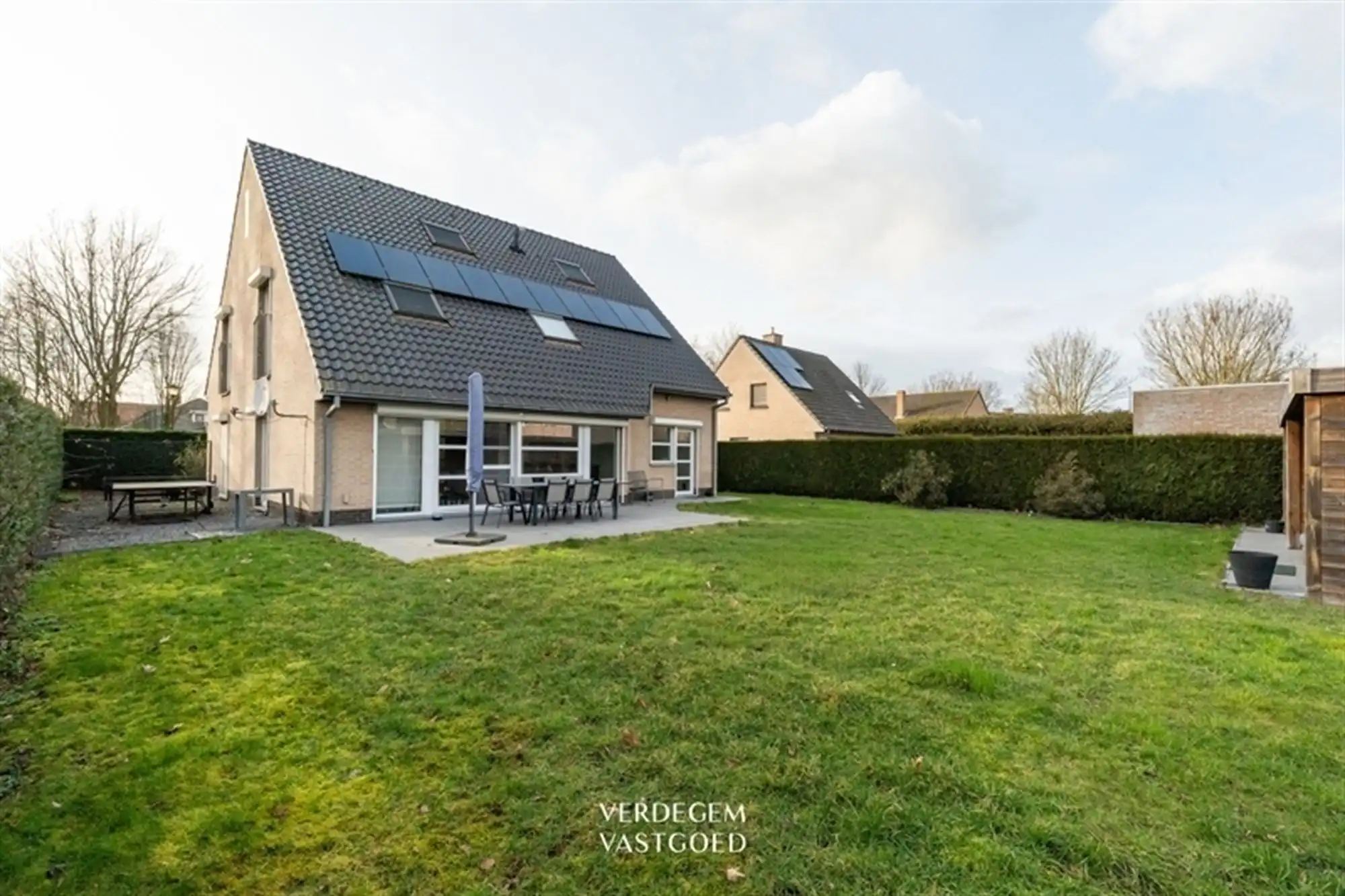 Ruime gezinswoning met 4 slaapkamers, garage en tuin in rustig straatje foto 23