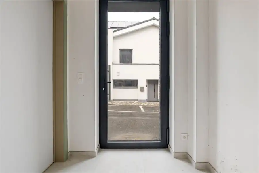 KNAPPE NIEUWBOUWWONING IN HET CENTRUM VAN BORGLOON (MOGELIJKHEID AANKOOP 6% BTW) foto 14