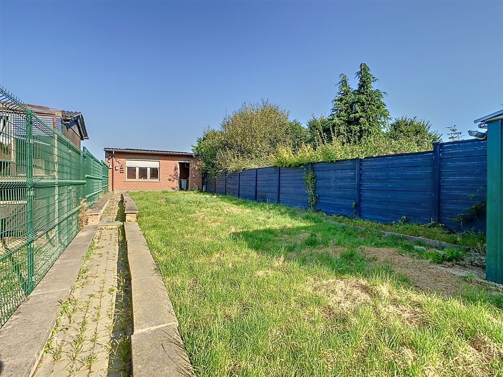 Charmante woning met tuin, garage, 2 slpks, 3a 07ca foto 6