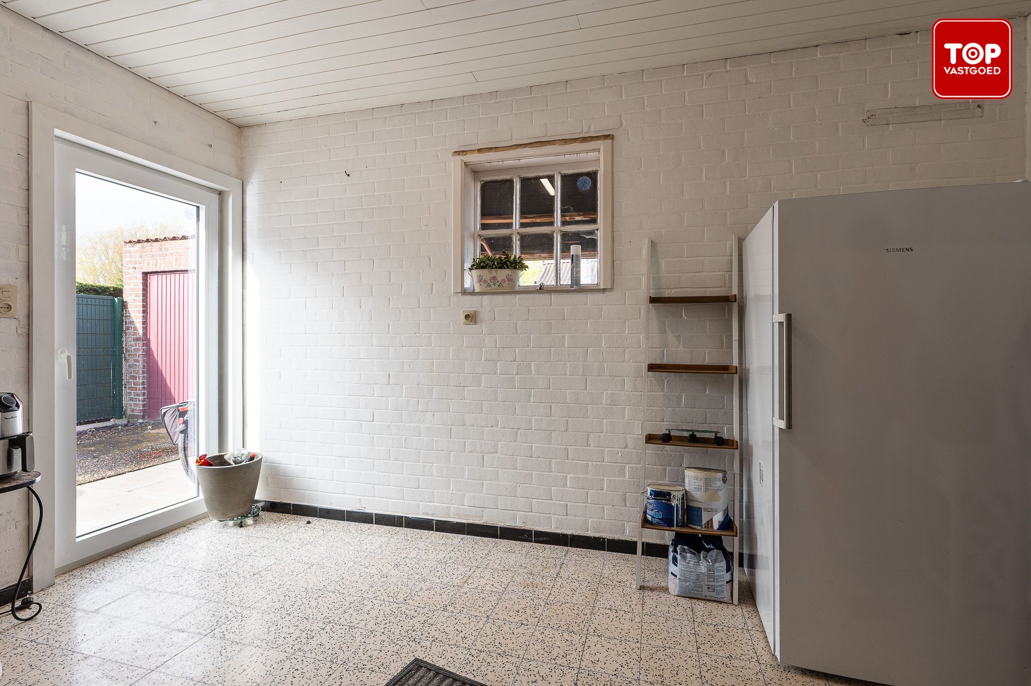 Halfopen woning met leuke tuin in centrum eeklo foto 10