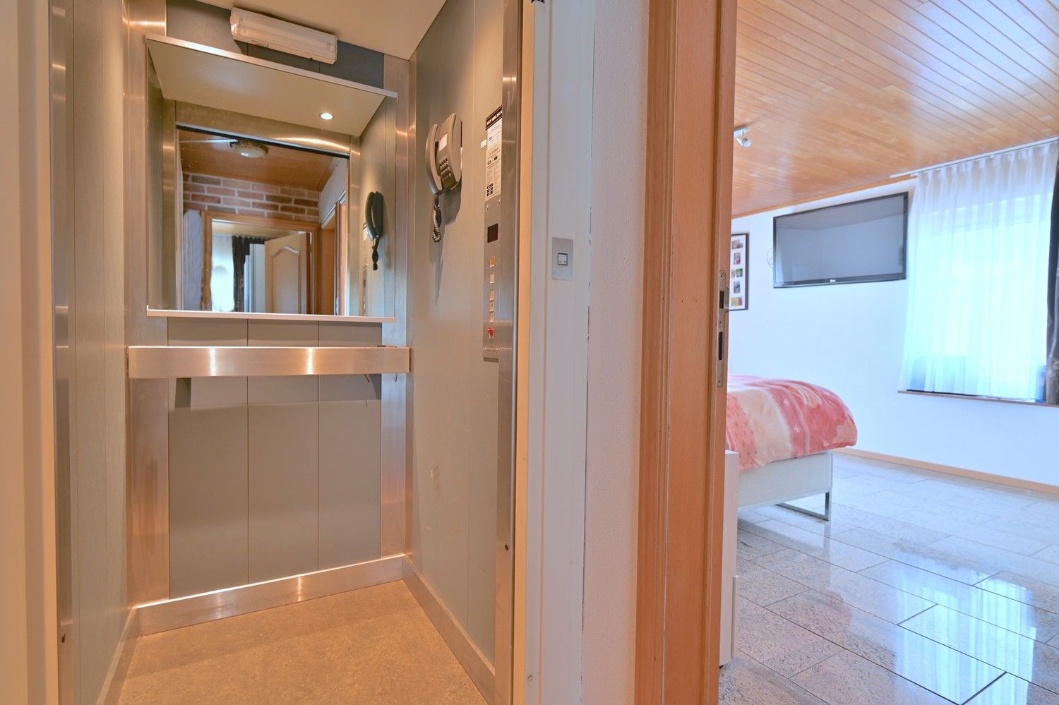 Halfvrijstaande woning met lift en zonnepanelen, zeer mooi gelegen aan de bosrand van Lanaken foto 14