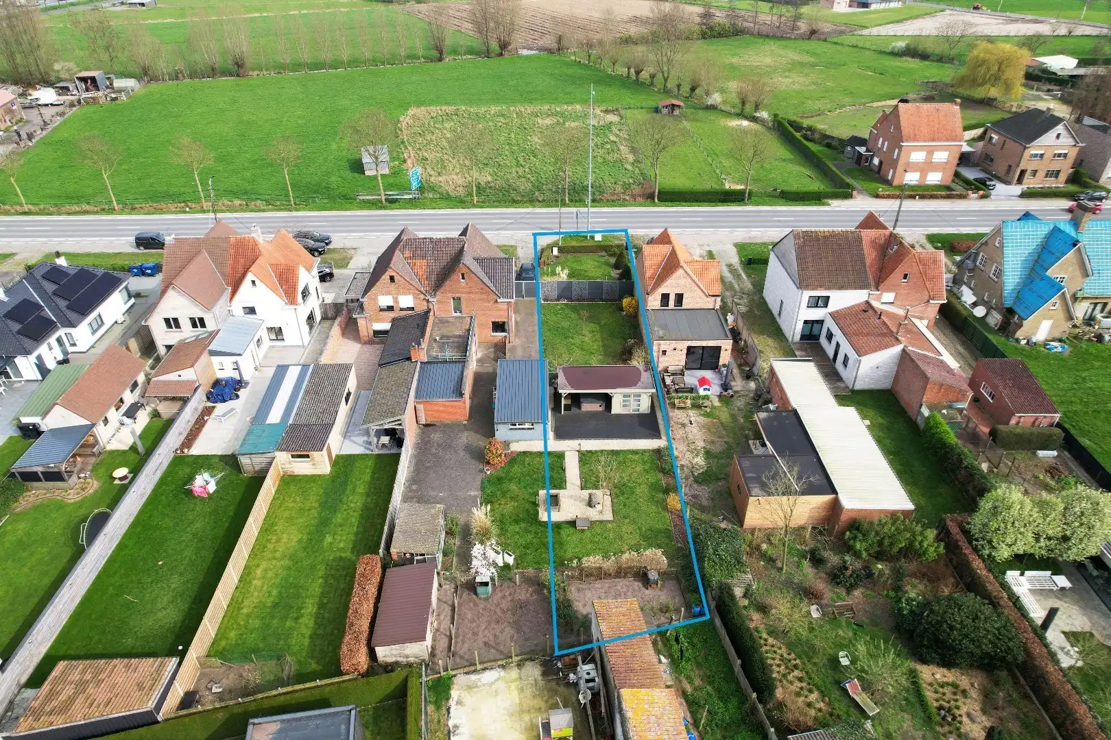 Lot bouwgrond voor halfopen bebouwing op 464 m² te Maldegem foto {{pictureIndex}}