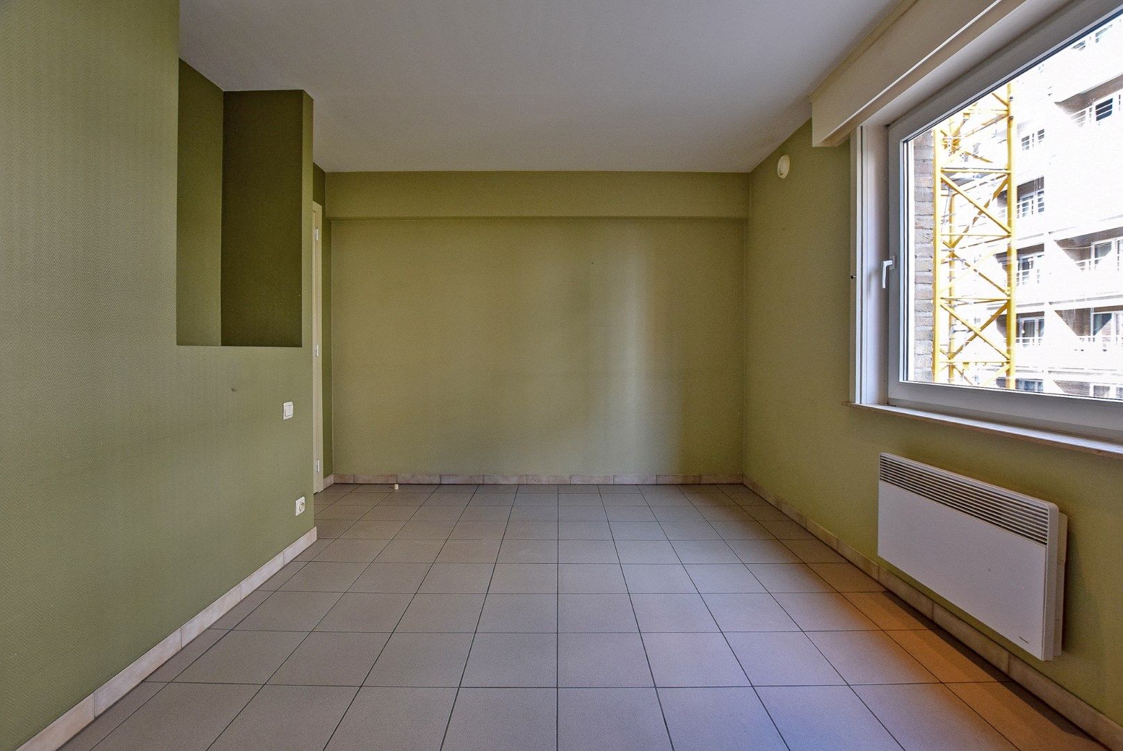 Goed gelegen 2-slaapkamerappartement te Oostduinkerke-Bad vlakbij de winkelstraat en het strand.  foto 12