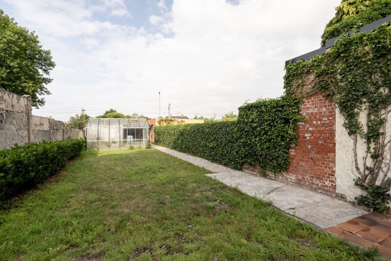 Ruime en veelzijdige rijwoning met garage achteraan en aparte ingang foto 20
