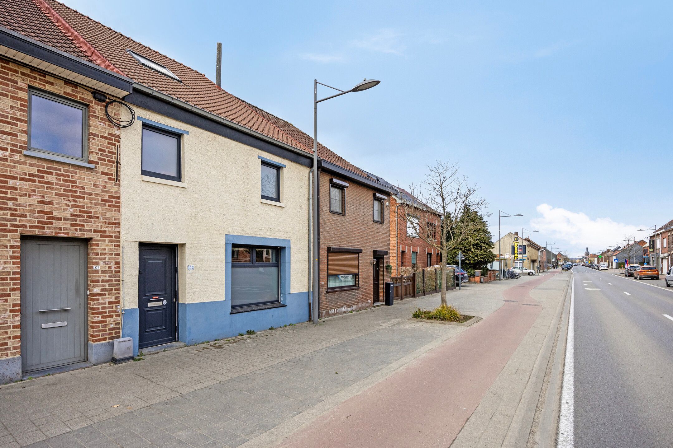 Charmante woning met omheinde tuin en garage foto 24