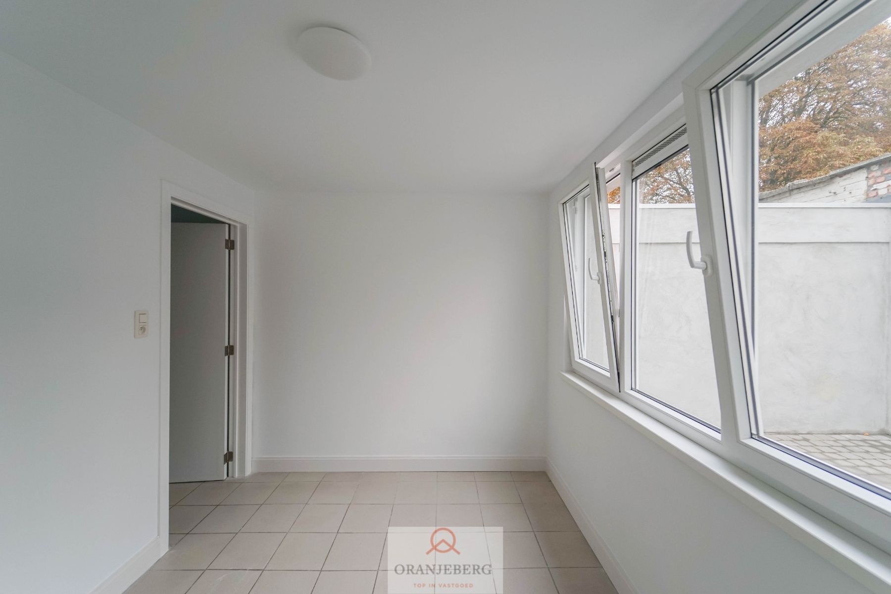 Appartement op het gelijkvloers met koertje (18 m²) te Rooigemlaan ! foto 4