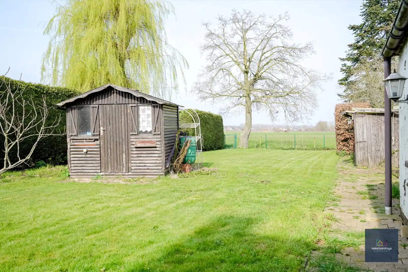 Ruime  halfopen bebouwing  met  zonnige tuin, terras en garage in Waarschoot  foto 27