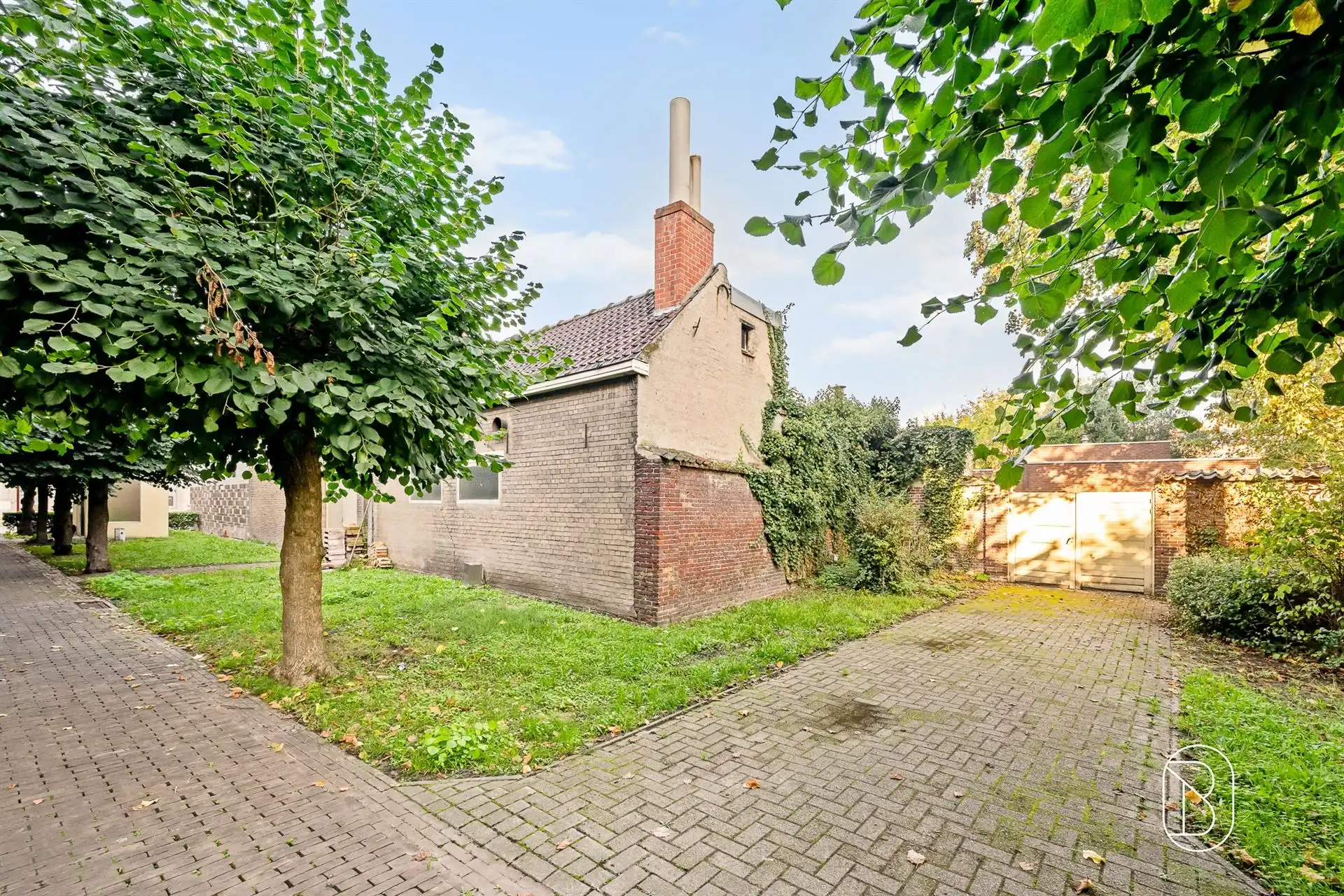 Handelspand met woonst, bijbouw en tuin in centrum Evergem. foto 10
