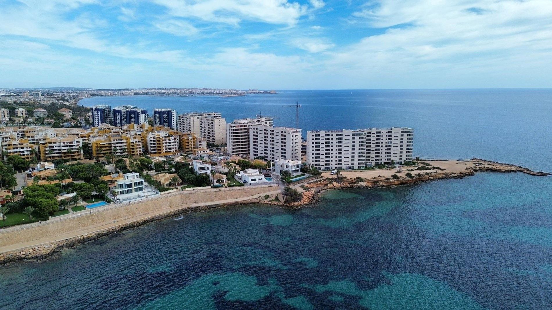 Appartementen te koop eerste lijn Punta Prima aan zee Spanje foto {{pictureIndex}}
