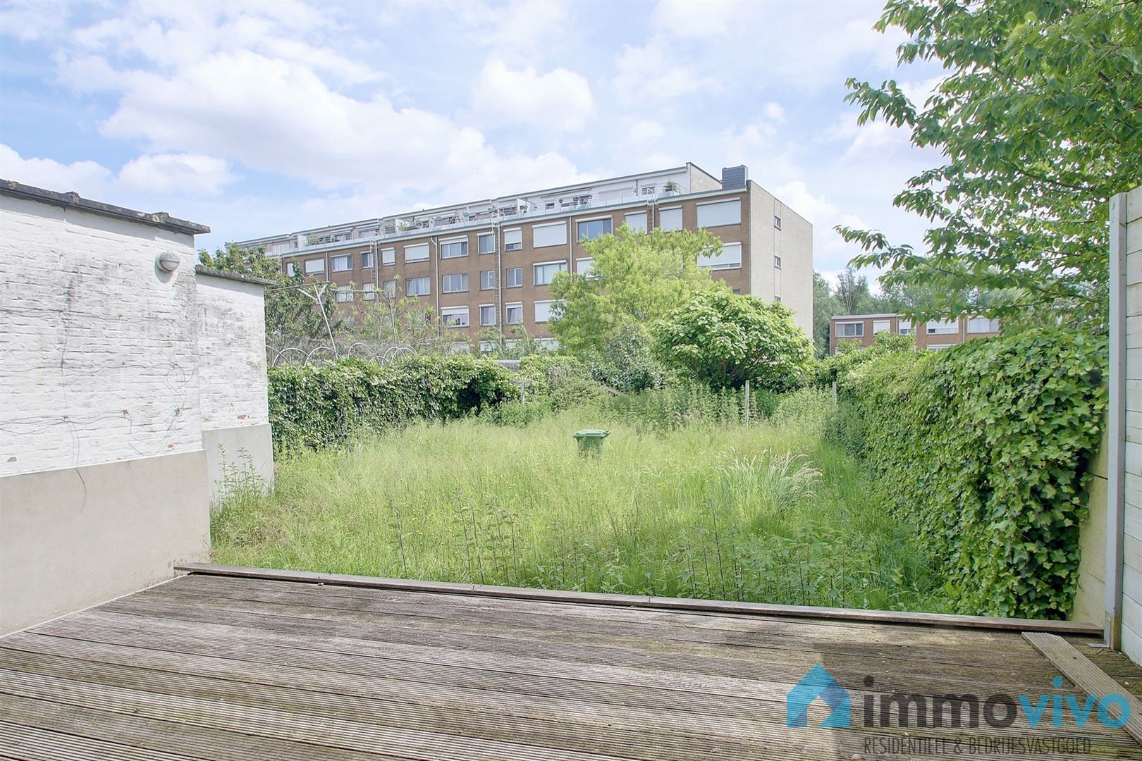 Appartement met binnenplaats en kantoor of tweede appartement met tuin. foto 16