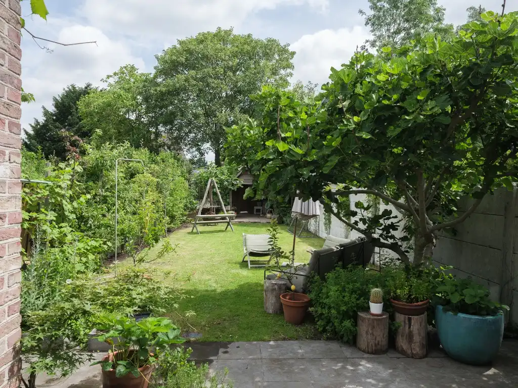 Instapklare gezinswoning met 4 slaapkamers op een groen perceel nabij Gent. foto 2