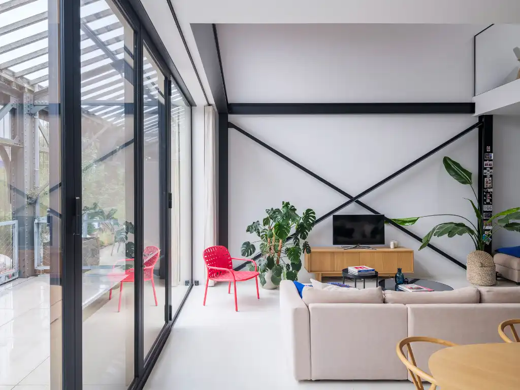 Luxueus en tijdloos – Exceptionele loft met 2 slaapkamers, aparte bureauruimte en ruim terras in een beschermd gebouw met een rijke industriële voorgeschiedenis. foto 7