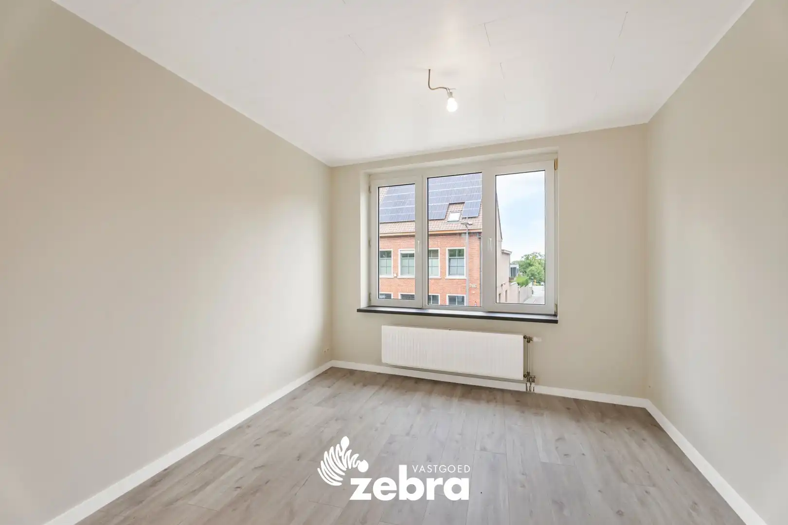 Gerenoveerd duplexappartement in het hartje van Tielt! foto 4