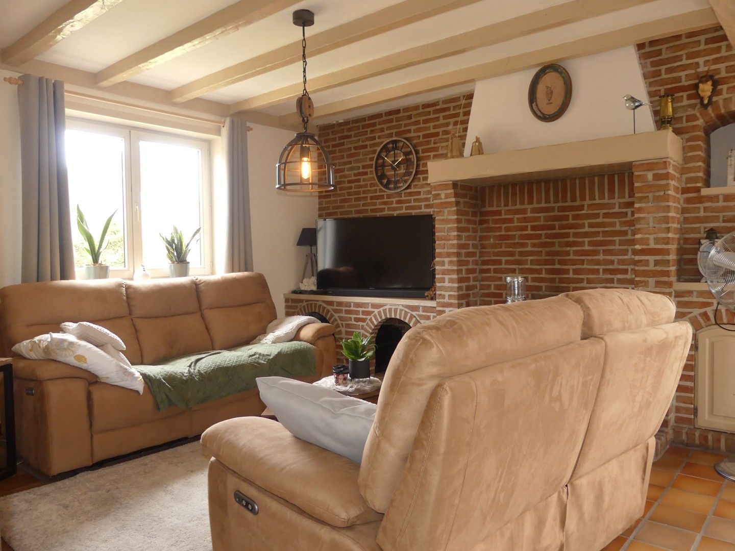 Alleenstaande woning met terras, zongerichte tuin en garage foto 3