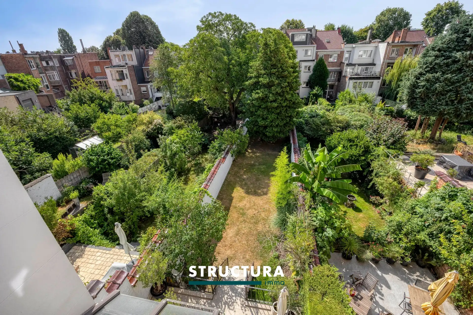 Ruime en lichtrijke woning met een aangename zuidgerichte tuin. foto 32