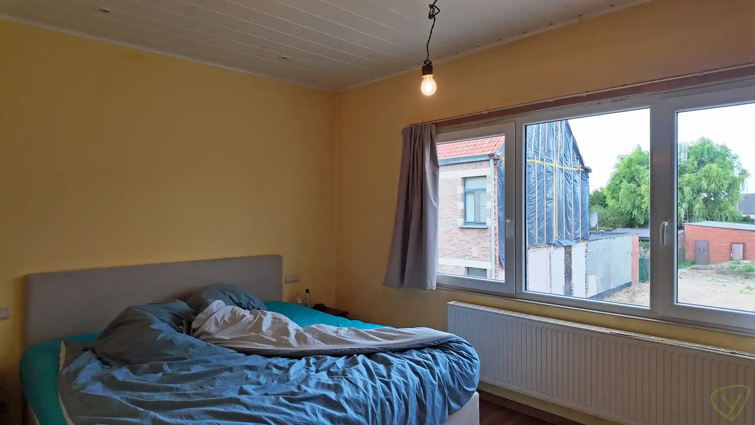 Interessante opbrengsteigendom met tuin in de Opeisingstraat foto 9