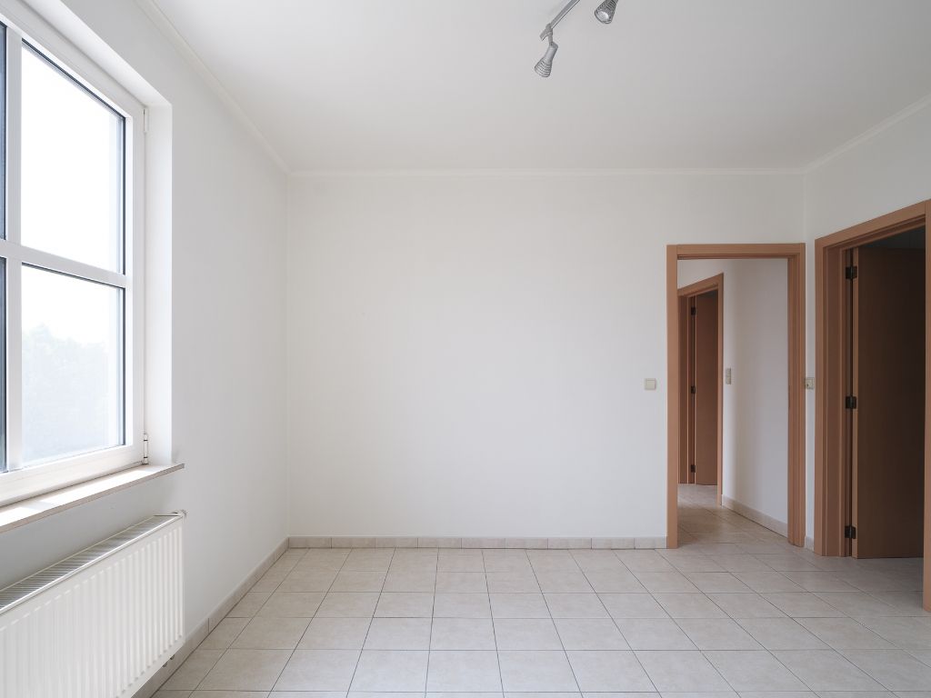 Licht op te frissen appartement met 3 slaapkamers en aangenaam terras met prachtig en open zicht over de Leie. Mogelijkheid tot aankoop autostaanplaats. foto 11