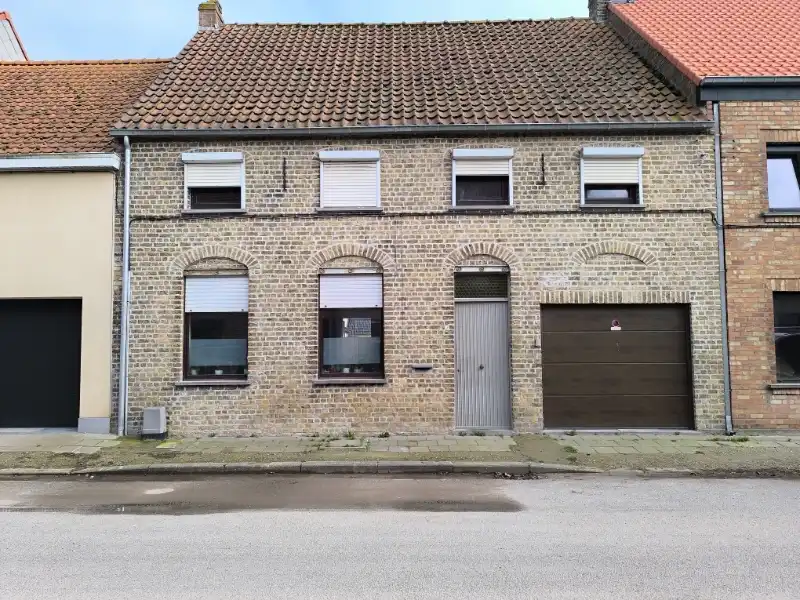 Rijwoning met garage en tuin foto {{pictureIndex}}