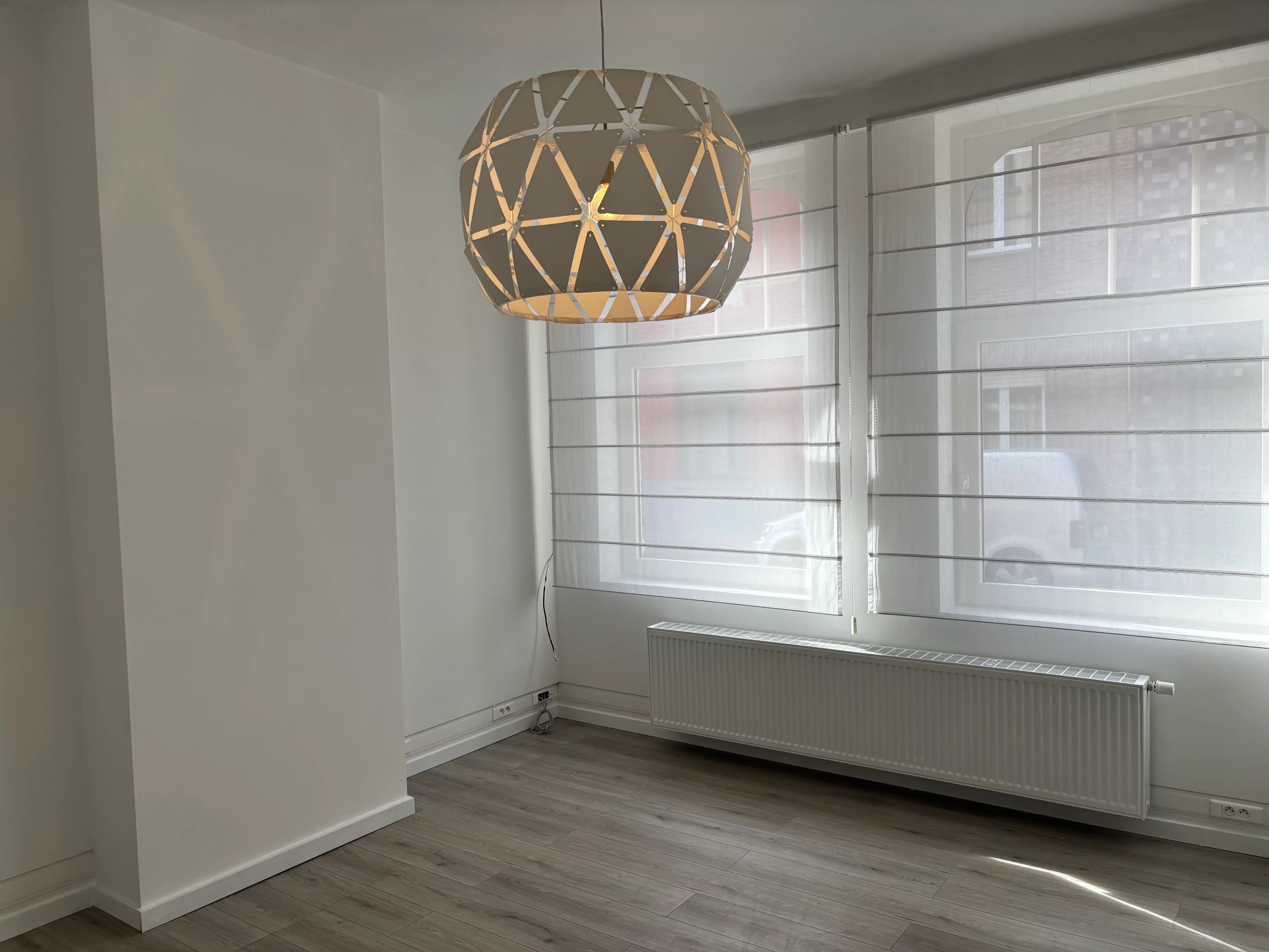 Gezellige rijwoning 4 slaapkamers + garage en stadstuin foto 2
