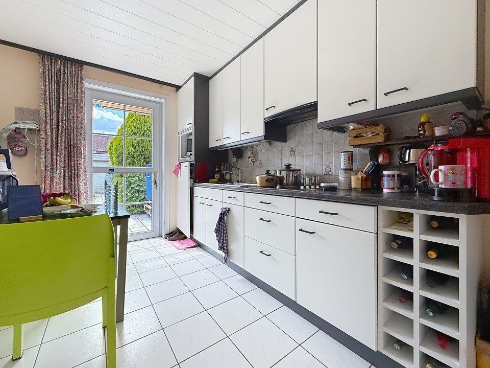 Goed gelegen woning met 3 slaapkamers én achterliggende garage foto 4