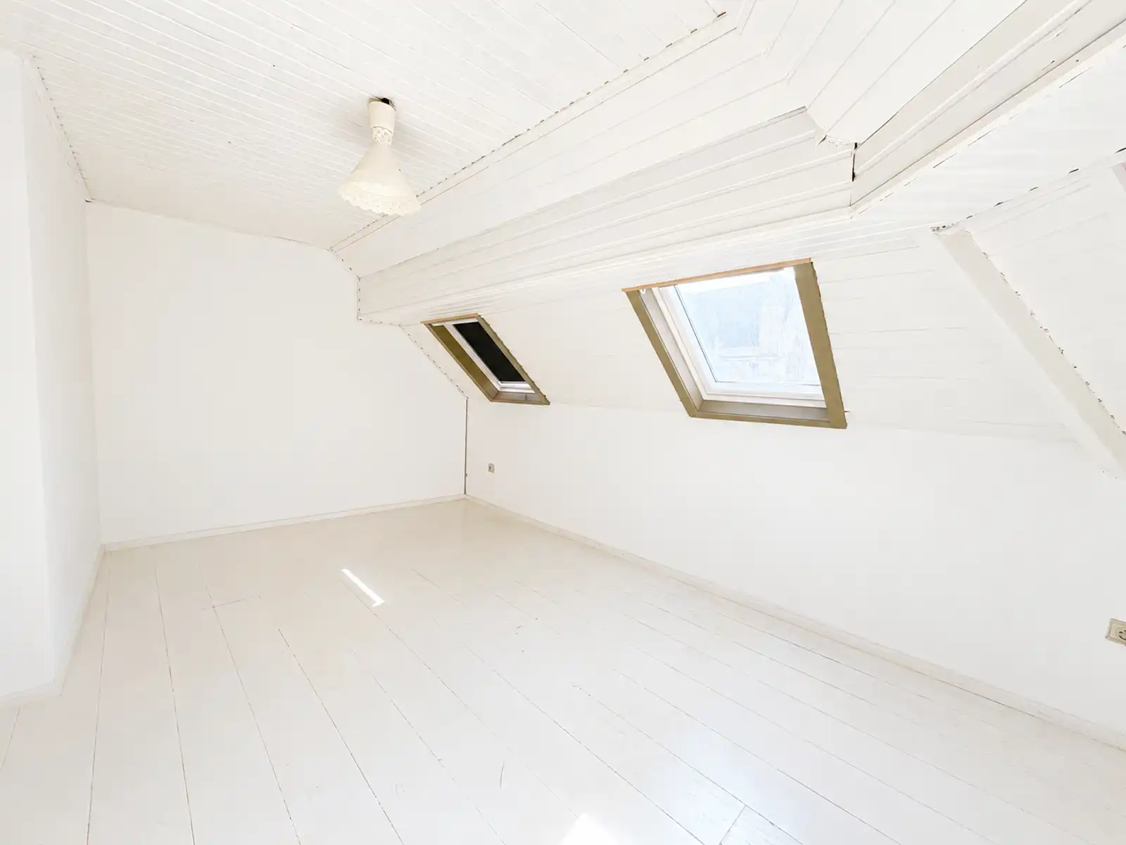 Ruim en lichtrijk duplex-appartement aan de kerk foto 4
