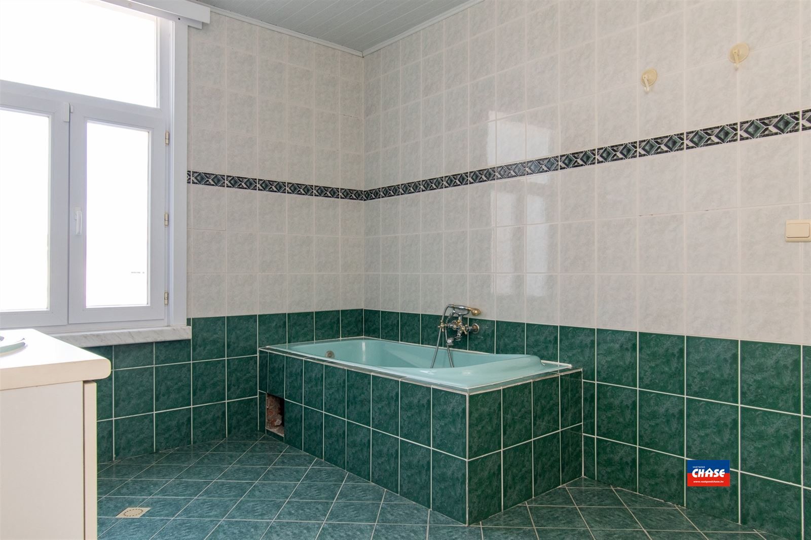 Instapklare woning met 4 slaapkamers en tuin foto 14