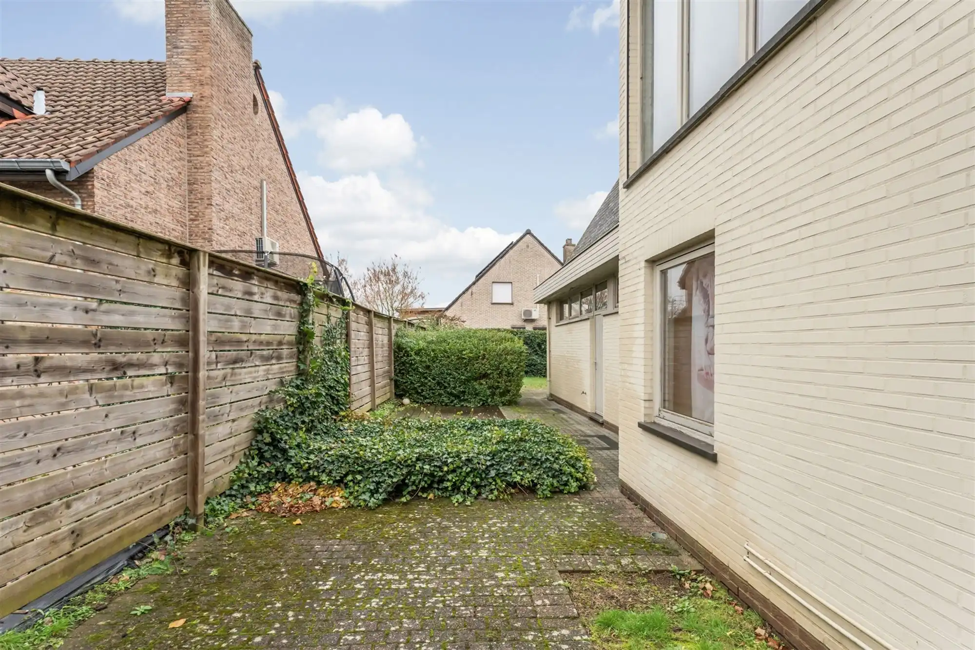 HANDELSPAND MET GOEDE VISIBILITEIT EN RUIME PARKING MET BOVENLIGGEND APPARTEMENT IN HEUSDEN-ZOLDER foto 24