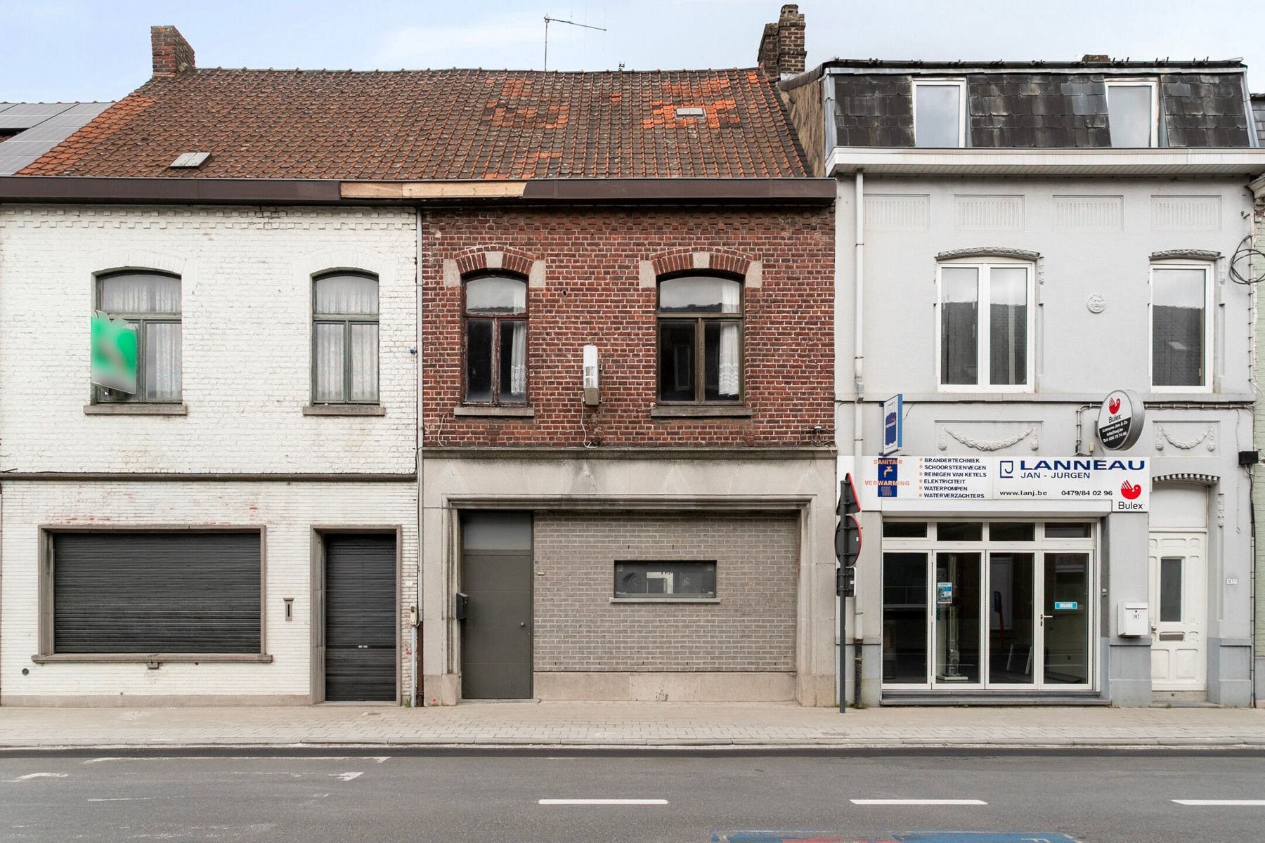 Te renoveren woning met zeer grote garage ! foto 5