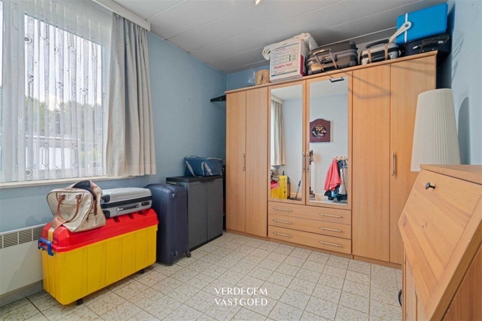 Gelijkvloers appartement met 2 slaapkamers, garage en privatieve tuin foto 11