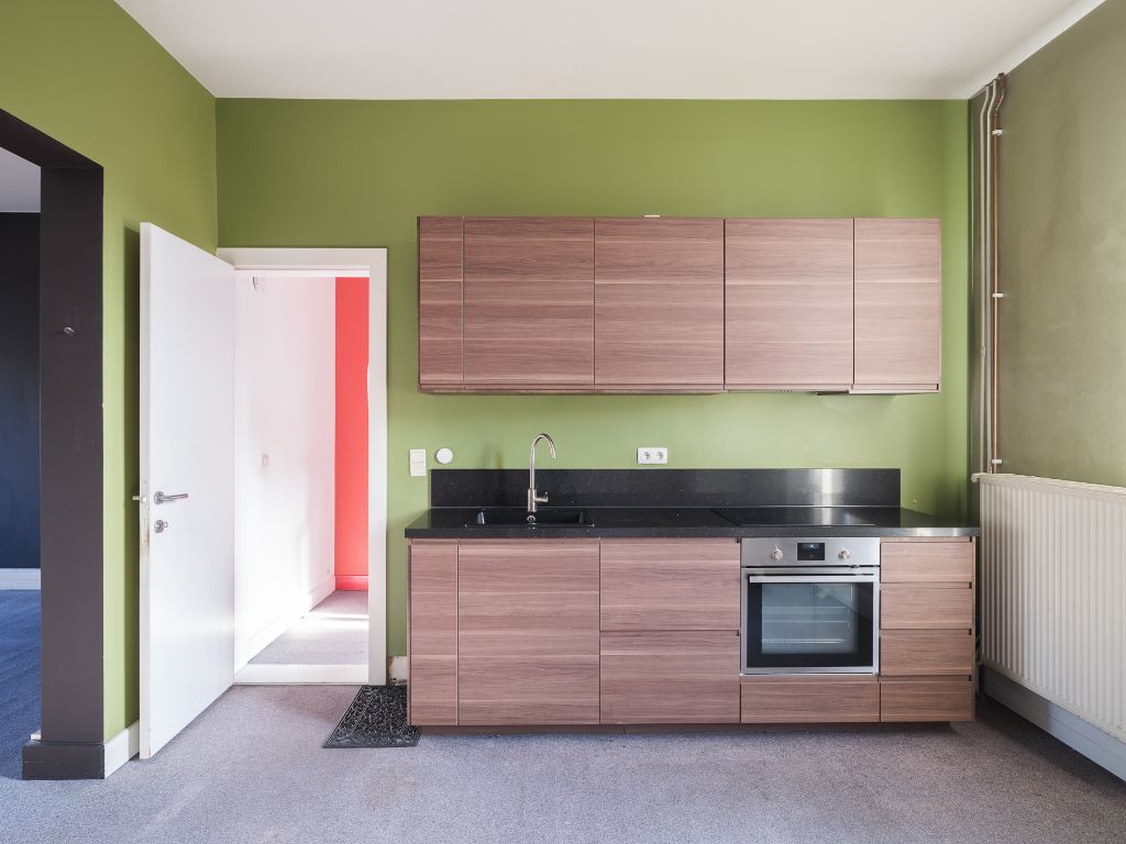 Karaktervolle herenwoning (= kantoor + woning) met buitenruimte aan de Coupure foto 12