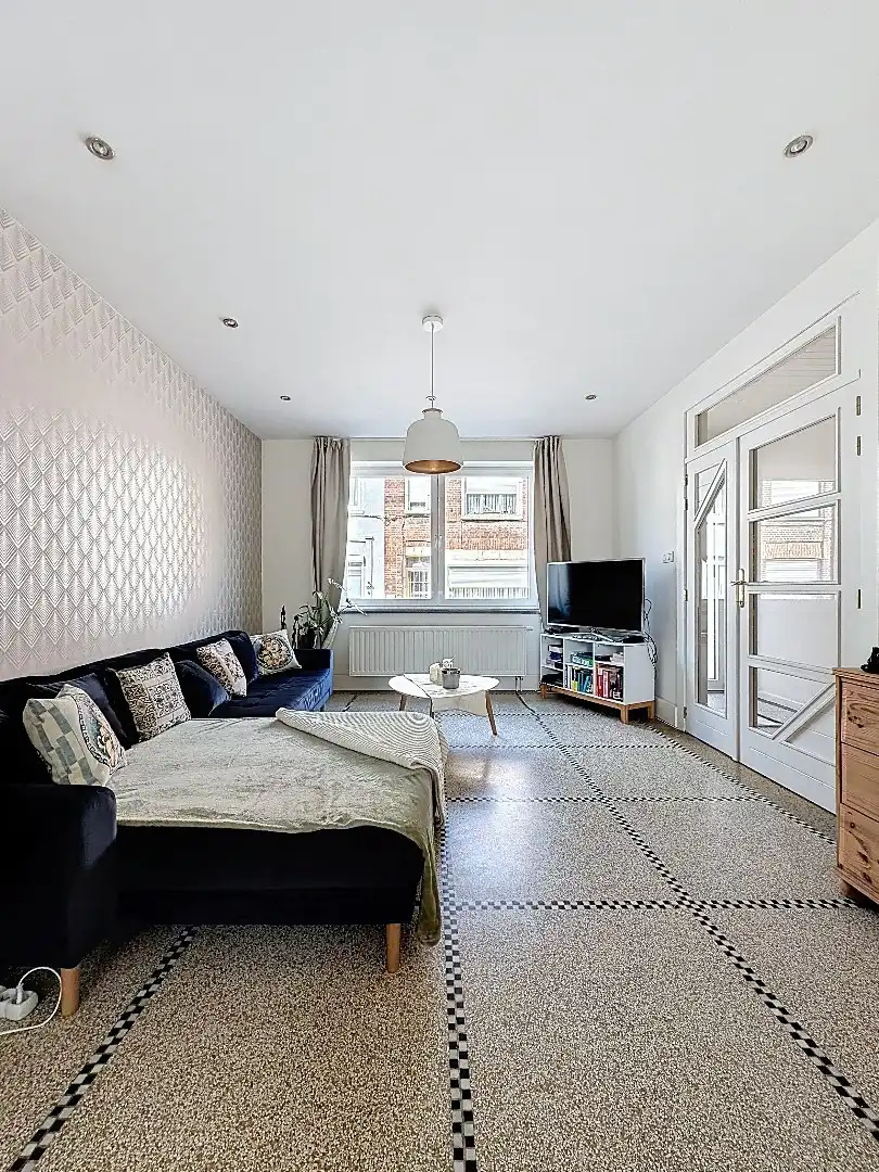 Ontdek deze instapklare parel in Tienen, waar comfort, ruimte en kwaliteit samenkomen. foto 2