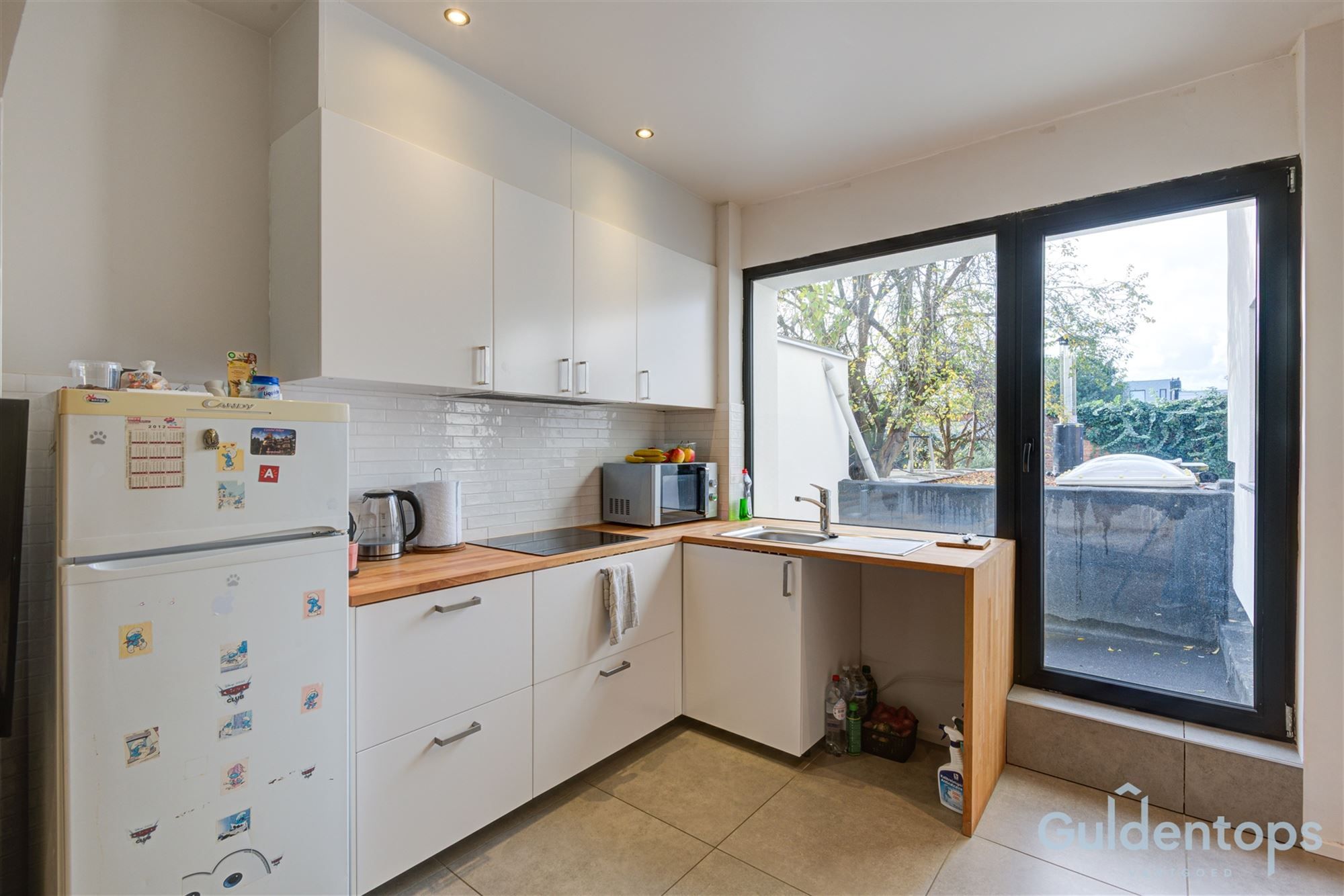 Knap gebouw bestaande uit 2 appartementen én magazijn foto 9