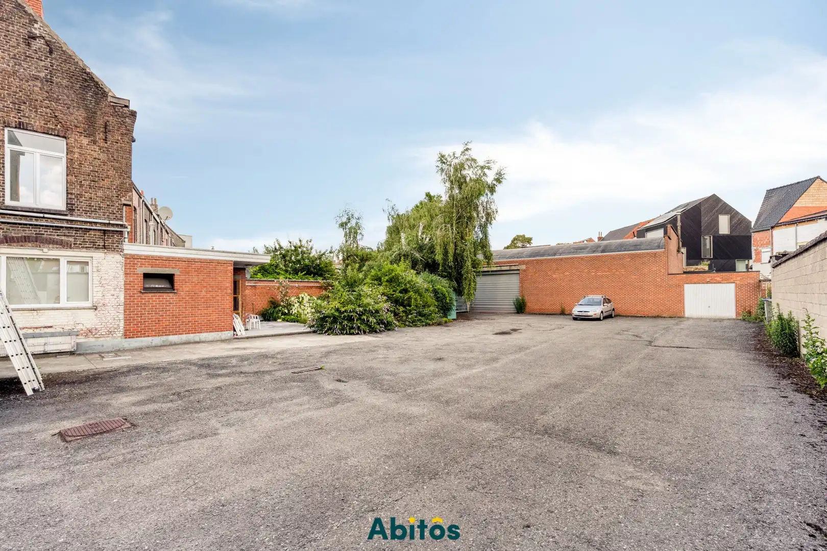 Opbrengsteigendom met 2 woningen, loods en garage in Gent foto 5