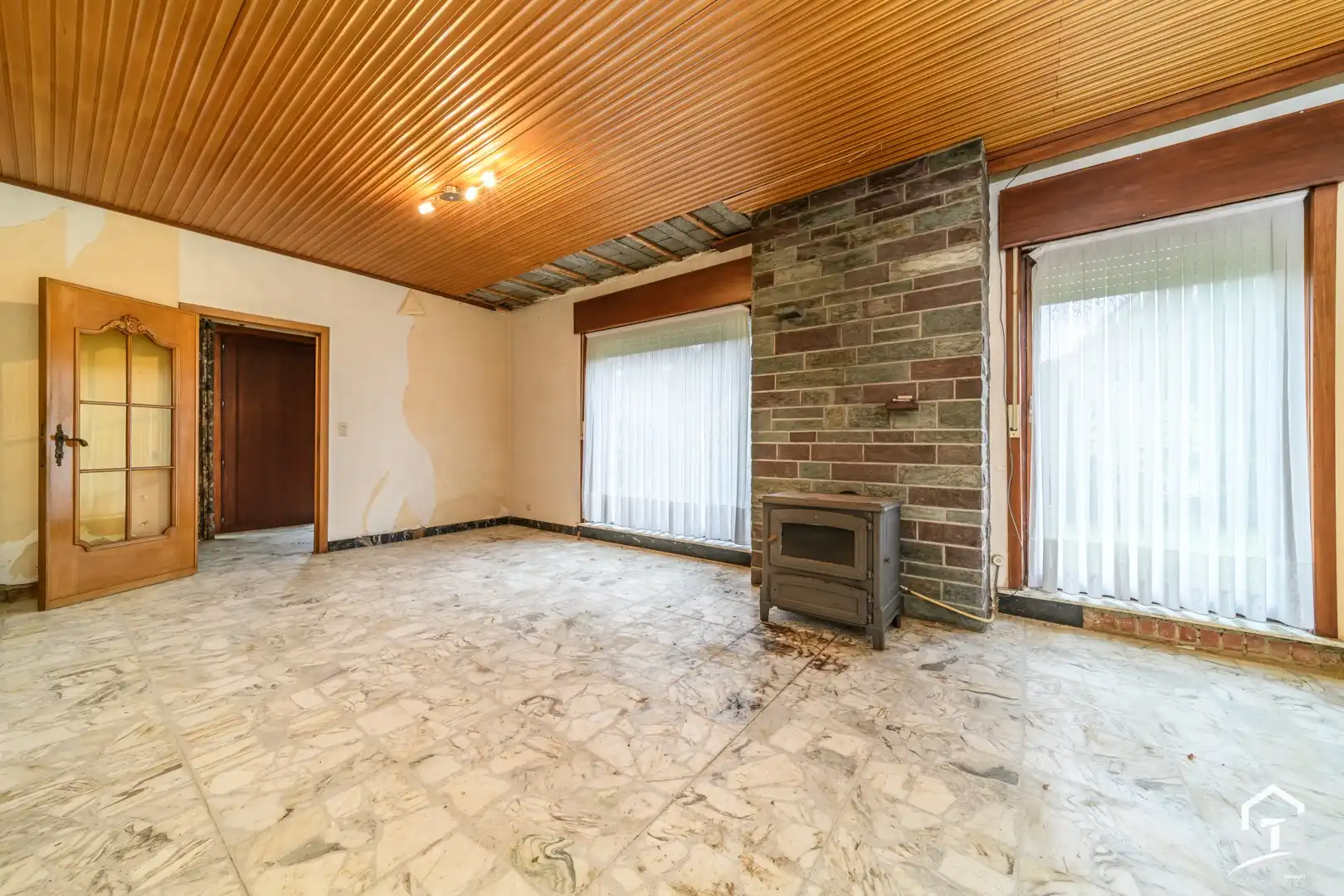 bungalow met achterliggende bouwgrond in het groene Hofstade foto 2