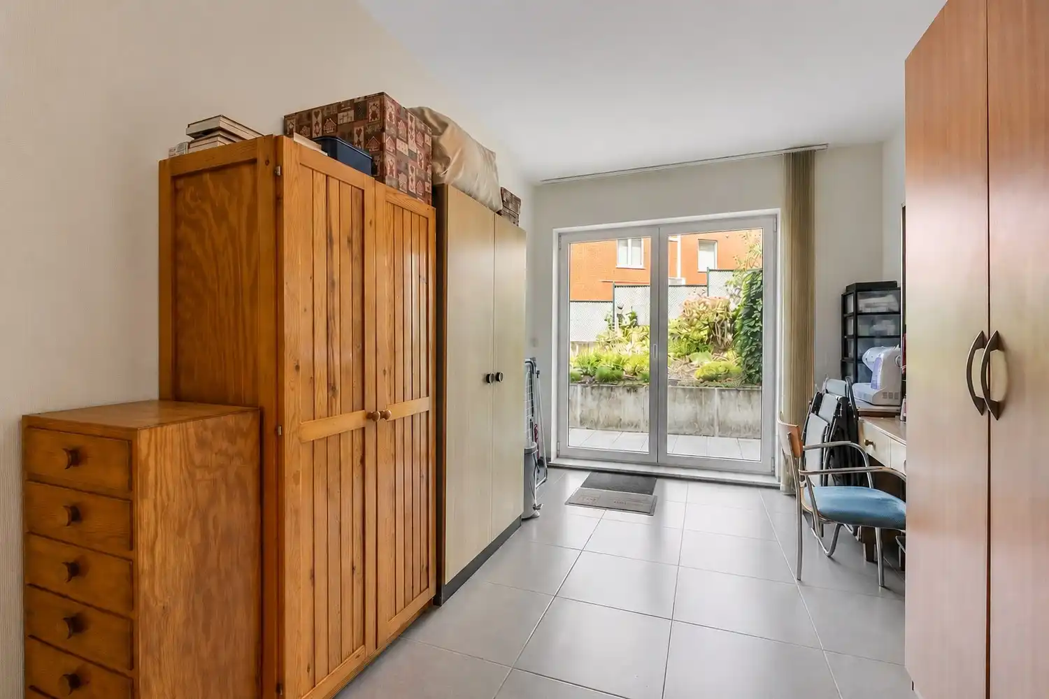 Goed onderhouden gelijkvloersappartement met 2 slaapkamers, ondergrondse autostaanplaats en kelder te Linden ! foto 13