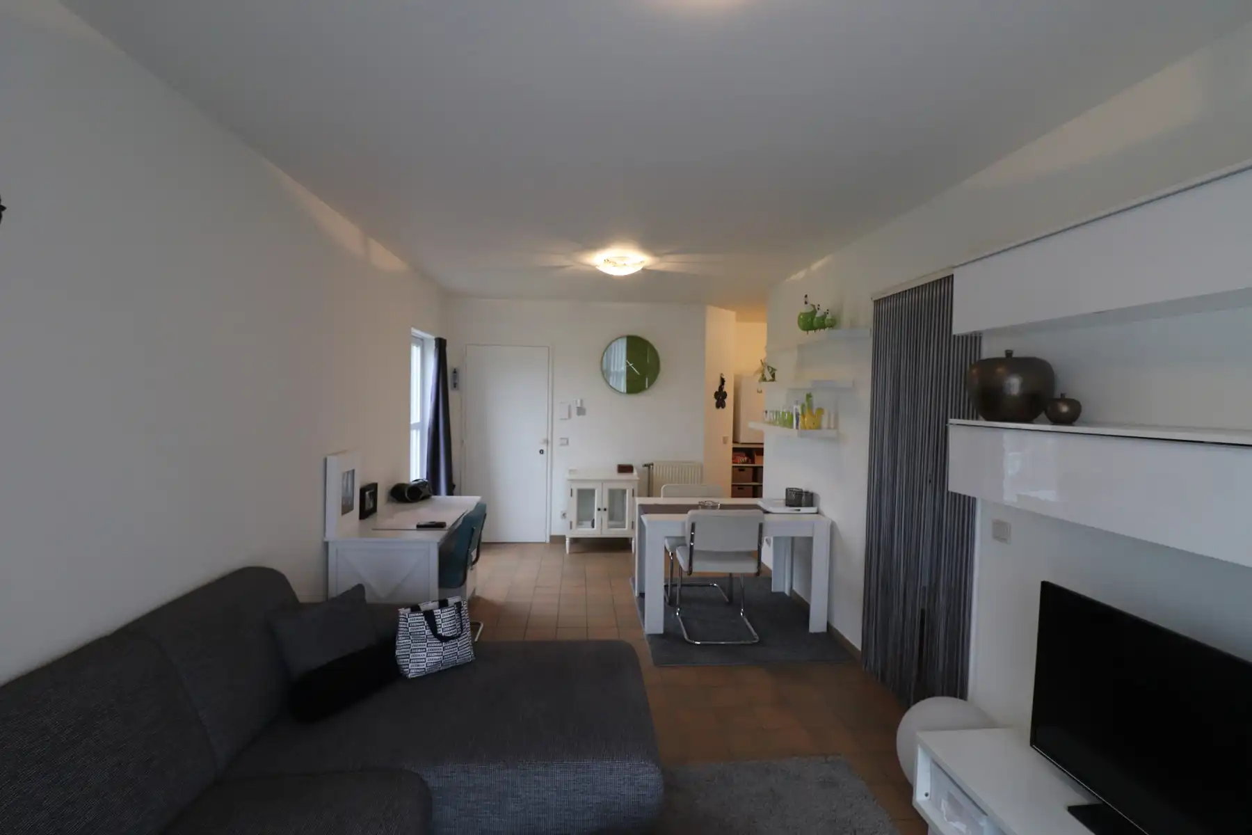 Een rustig gelegen appartement met kelderberging en autostaanplaats foto 4