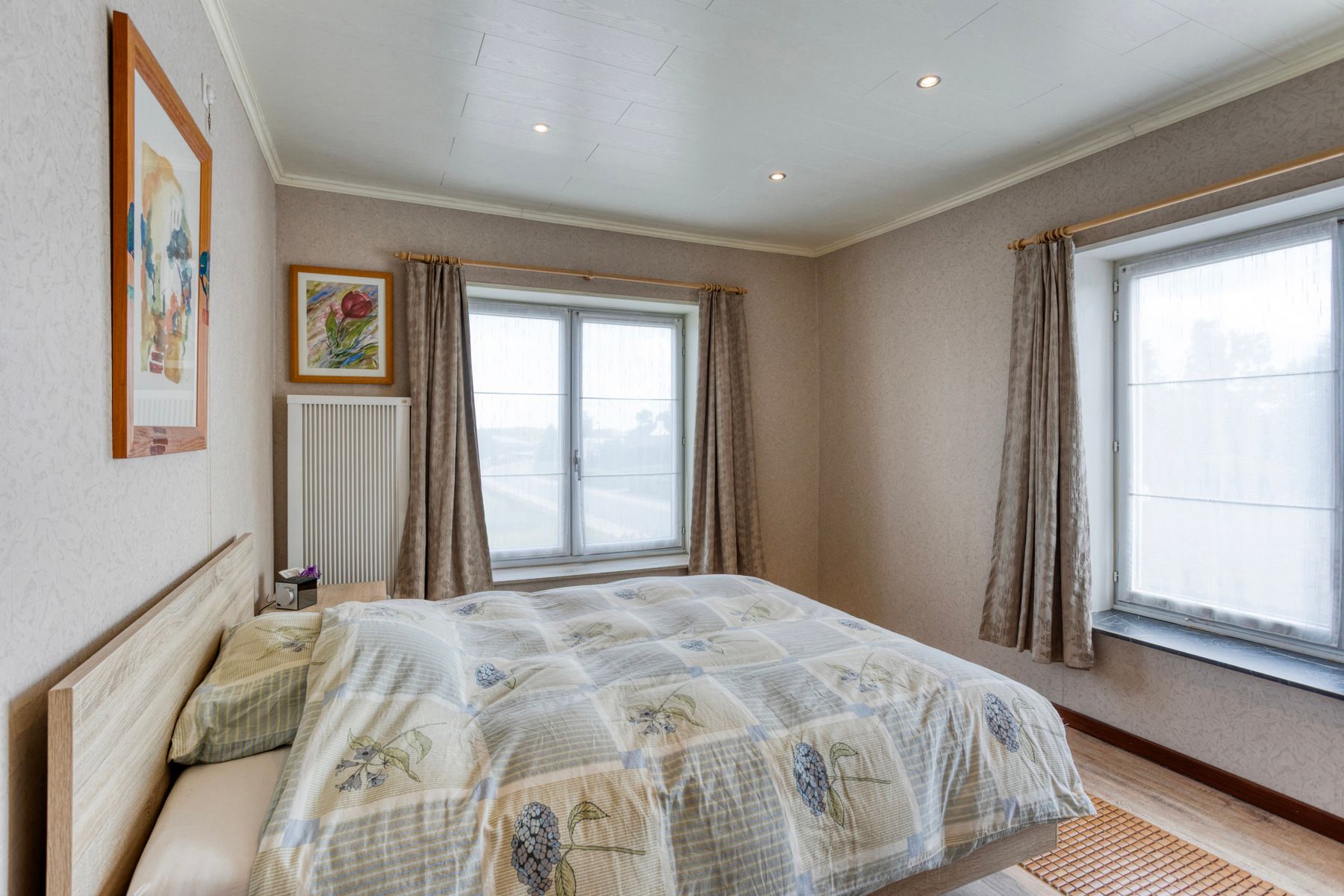 Open bebouwing met 4 slp, tuin, garage en prachtig uitzicht! foto 16