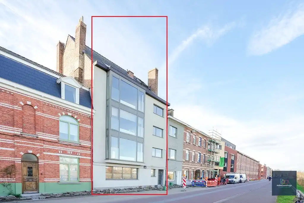 Ruim gelijkvloersappartement met 2 slaapkamers , een  zuidgeorienteerde  tuin en garage foto 14